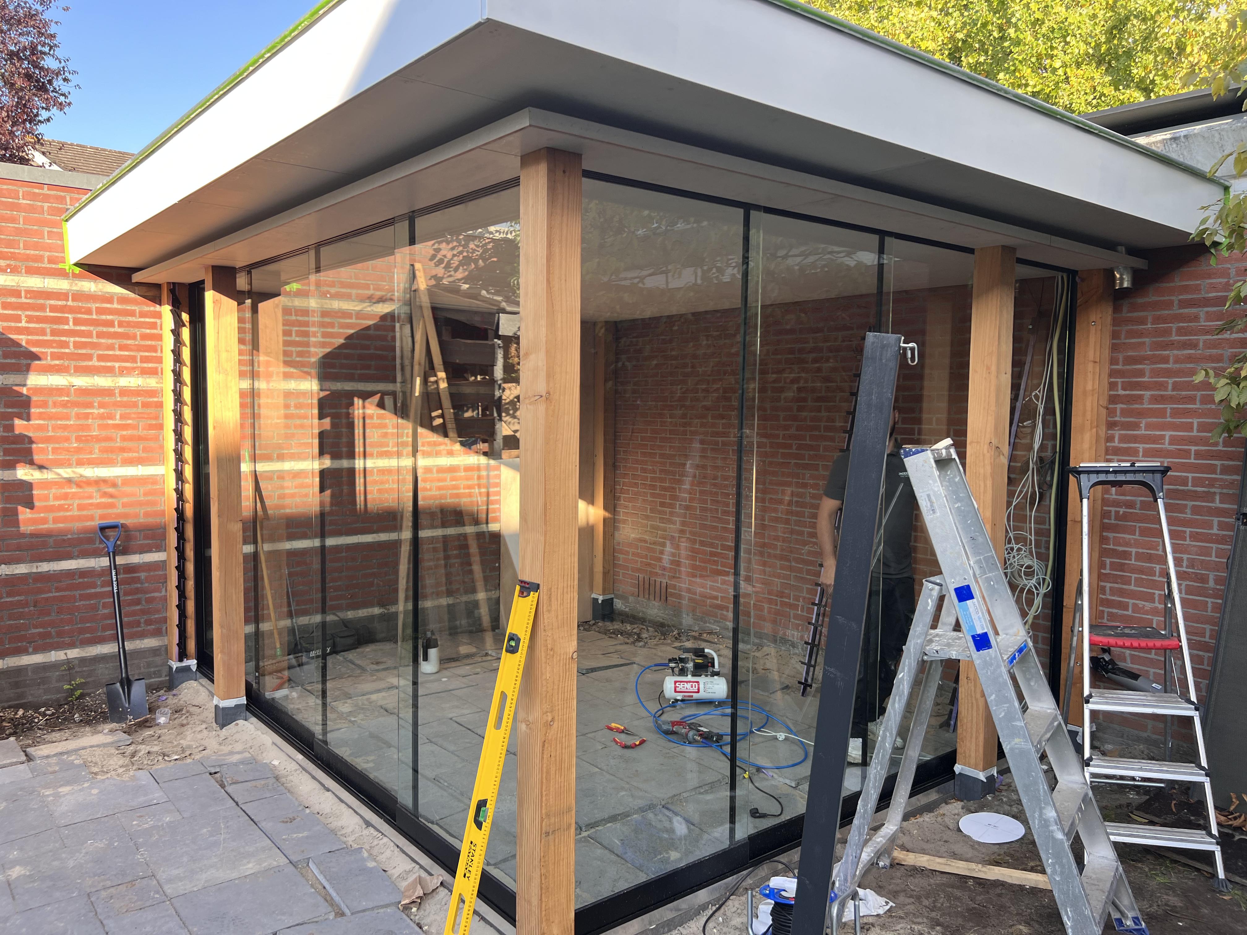 Het idee een mooie overkapping in de tuin